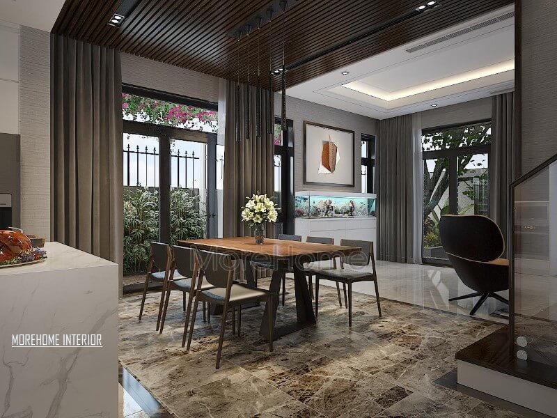 Thiết kế phòng ăn hiện đại thông thoáng, chan hòa với thiên nhiên từ hệ cửa lớn giúp ánh sáng lan tỏa tối đa nhưng vẫn chắn nắng kịp thời từ rèm 2 lớp. thiết kế biệt thự
